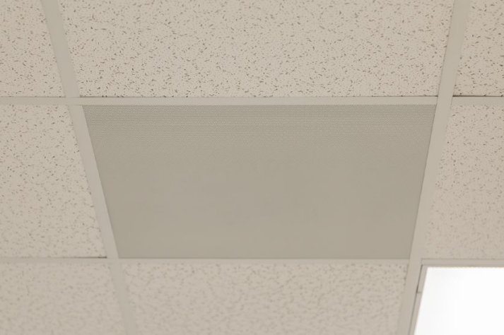 Ceiling tile speaker in classroom