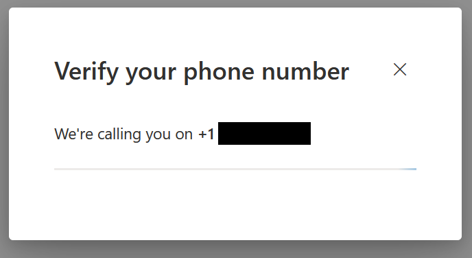 "verify your phone number" screen indicating a call is in progress